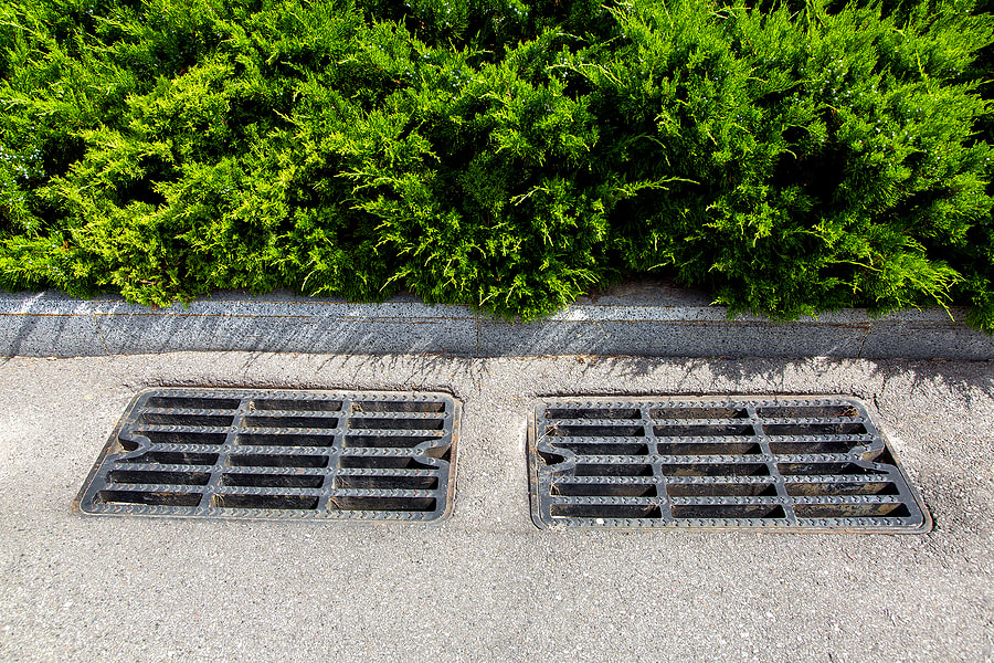 an exterior french drain made of metal